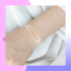 Snaffle Bit solid Sterling Silver Bangle with Rose Gold Accents modelled
