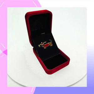 Dachshund Sterling Silver plated Brooch with Enamels in festive reindeer costume presented in a red gift box