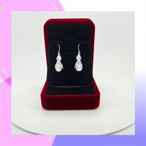 Octopus Sterling Silver hook Earrings with Freshwater Pearl presented in a gift box