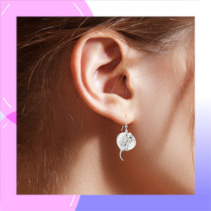 Stingray Sterling Silver Mother of Pearl dangle Earrings modelled