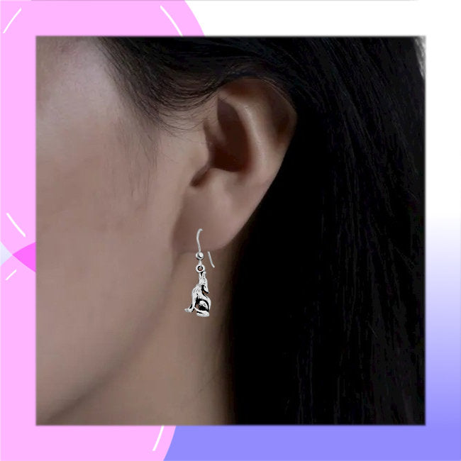 Wolf Sterling Silver dangle Earrings modelled
