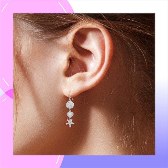 Starfish, Sand Dollar & Shell Sterling Silver dangle Earrings modelled