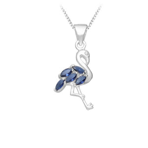 A silver-toned flamingo pendant necklace featuring marquise-cut blue gemstones on the body, shown against a plain white background.