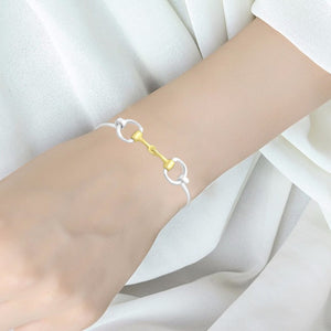 Snaffle Bit solid Sterling Silver Bangle with 14kt Gold Accents modelled